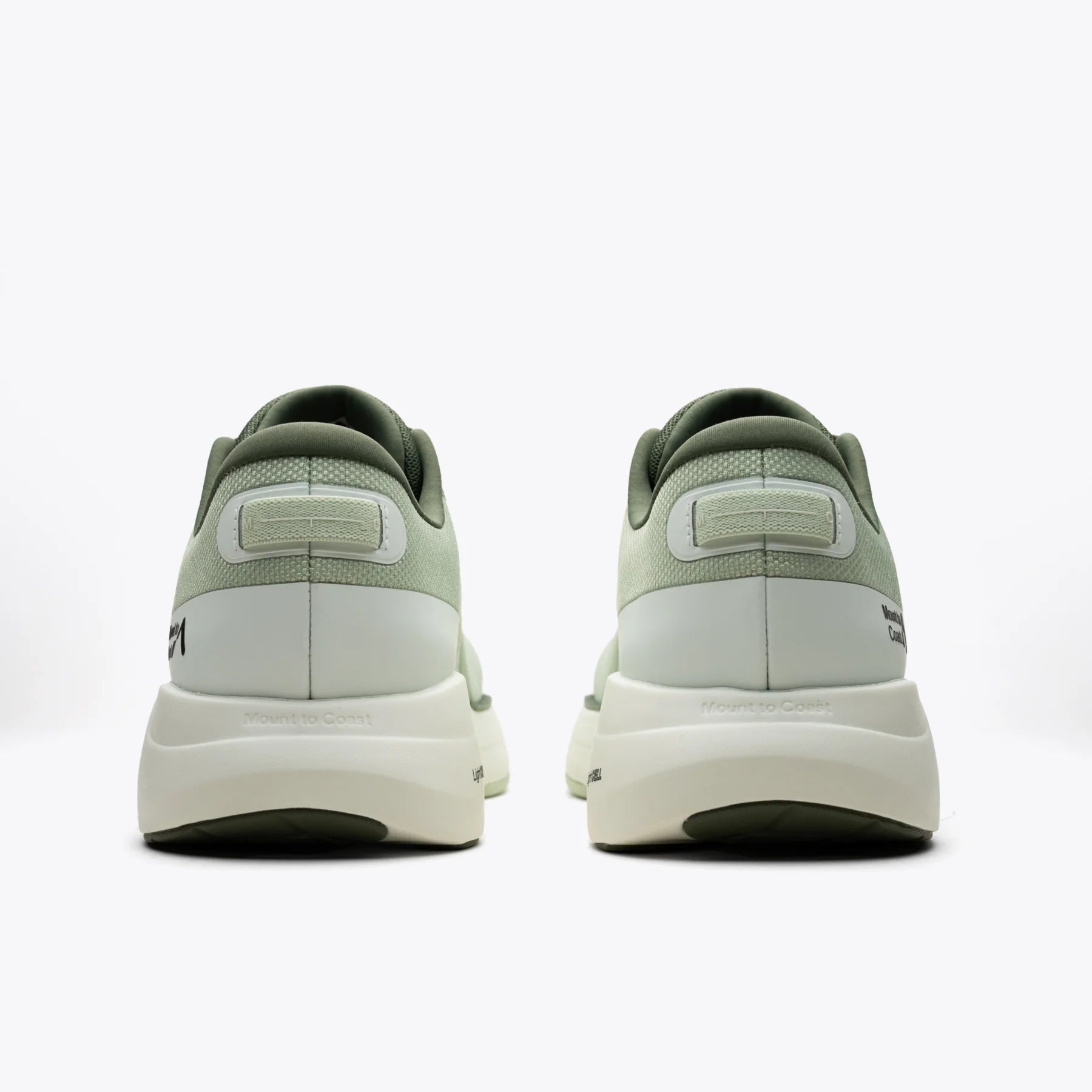 P1 Agave stability running shoe, rear view in light green with Mount to Coast branding.