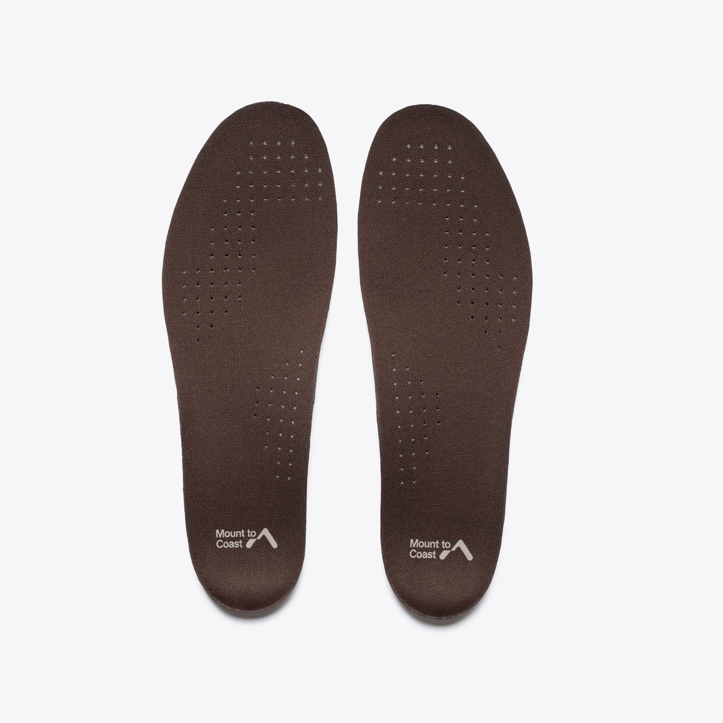 Mount to Coast T1 trail running shoe insoles. Brown, with ventilation holes, brand logo.
#Color_dune