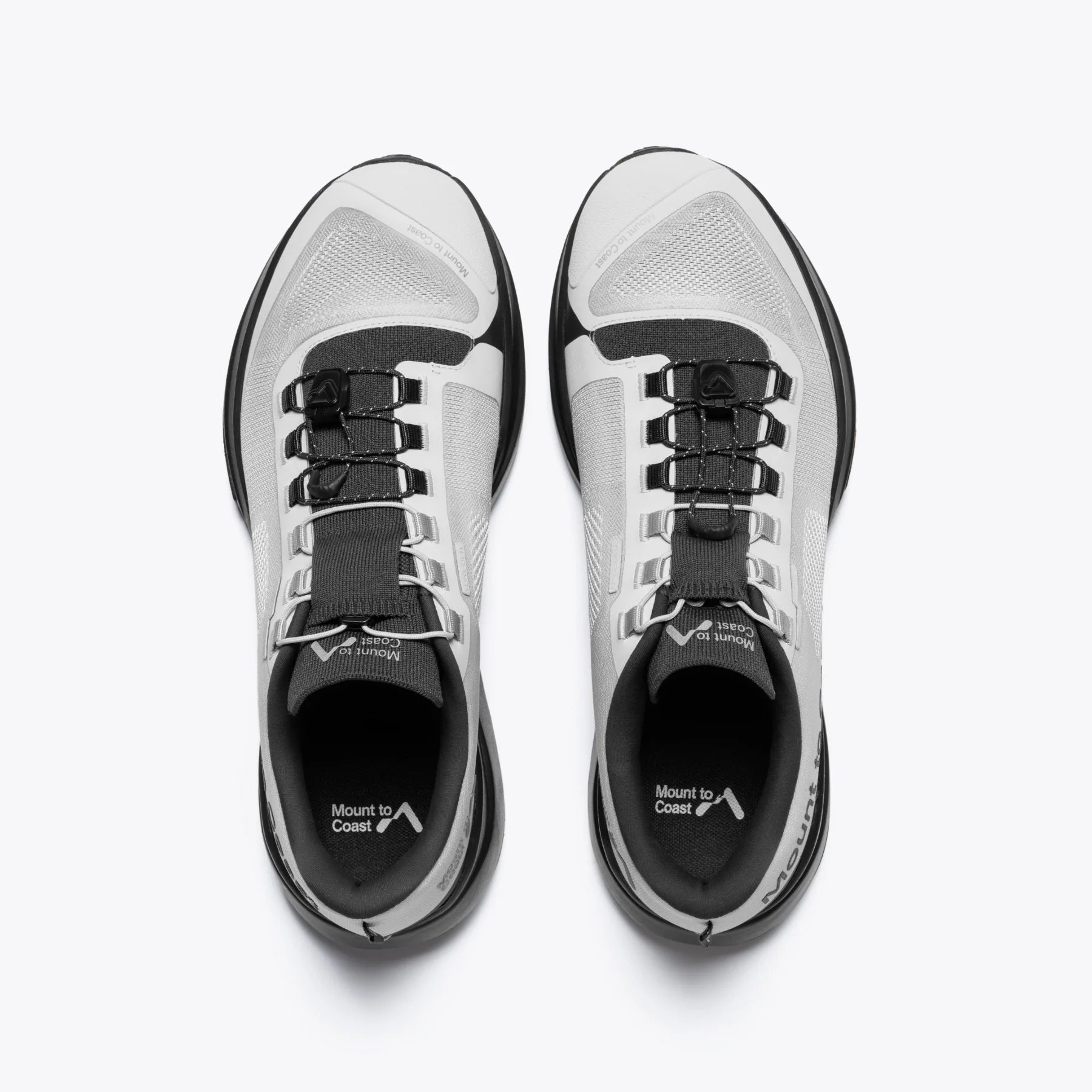 Mount to Coast T1 trail shoes, white and black, for long-distance trail running. Featuring Light Cell technology.
#Color_tephra