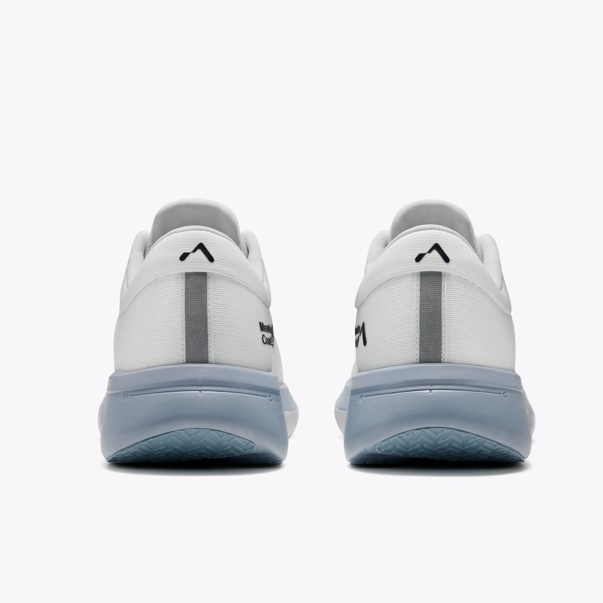 Mount to Coast R1 running shoe rear view in white, showcasing its heel design and GOFLOW technology. #Color_twilight