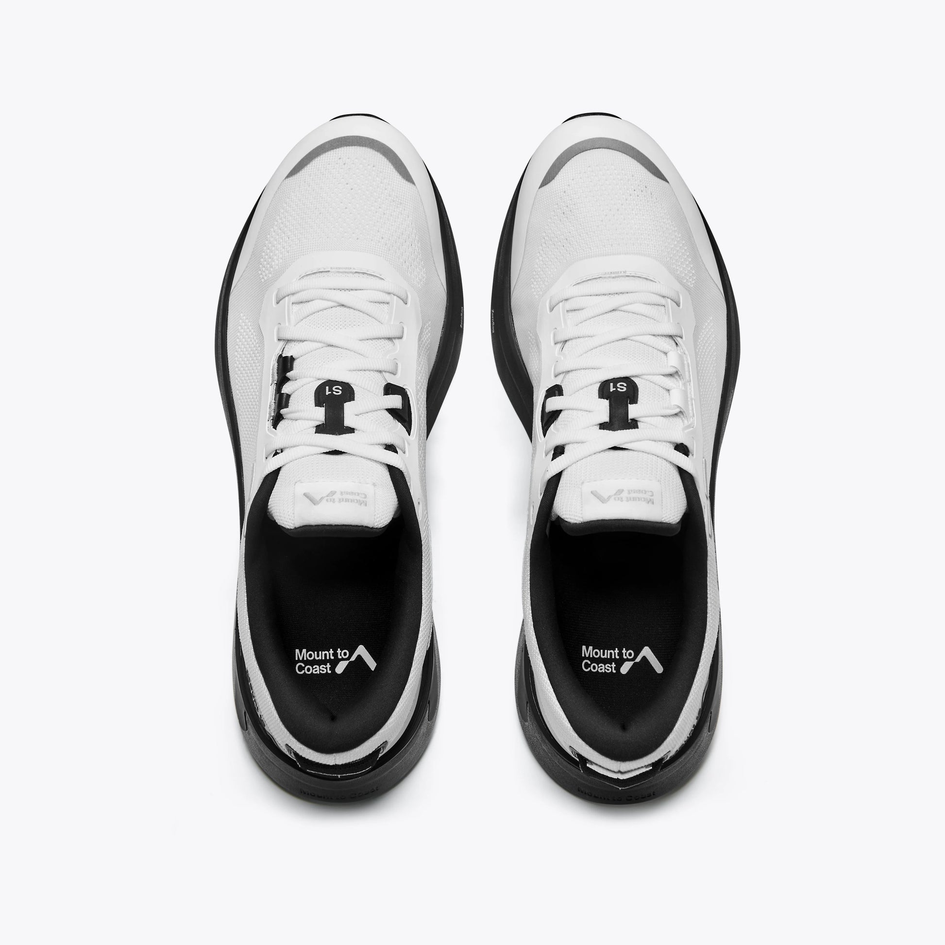 Mount to Coast S1 running shoes, overhead view. White and black design, ideal for road running. #Color_white|black